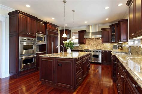 stainless steel or copper sink with cherry cabinets|dark brown cherry cabinets.